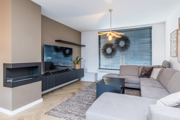 Foto - Te koop: Instapklare gemoderniseerde geschakelde 2 onder 1 kap woning met aanbouw, 3 slaapkamers, garage en een tuin in Voerendaal